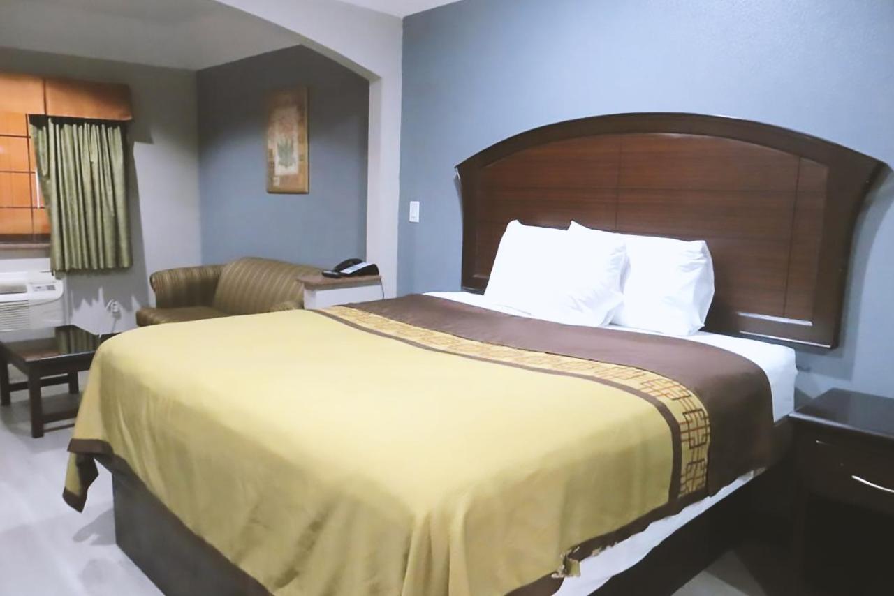 Blue Way Inn & Suites By Jasper Houston Exteriör bild